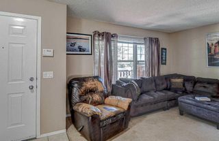 Photo 4: 122 Everwillow Circle SW in Calgary: Evergreen Semi Detached (Half Duplex) for sale : MLS®# A2071137