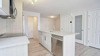 Photo 11: 43 carringwood Manor NW in Calgary: Carrington Row/Townhouse for sale : MLS®# A2123207