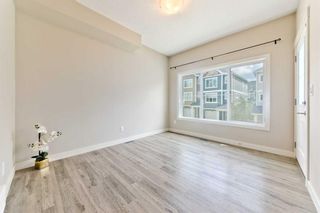 Photo 12: 373 Nolancrest Heights NW in Calgary: Nolan Hill Row/Townhouse for sale : MLS®# A2143274