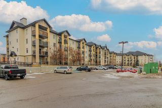 Photo 1: 8323 304 Mackenzie Way SW: Airdrie Apartment for sale : MLS®# A2021721