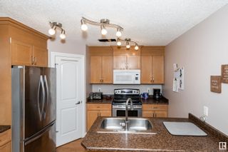Photo 10: 2704 TERWILLEGAR Way in Edmonton: Zone 14 House Half Duplex for sale : MLS®# E4300923