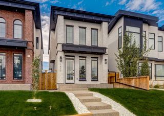 Main Photo: 1411 44 Street SW in Calgary: Rosscarrock Detached for sale : MLS®# A2084307