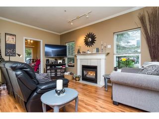 Photo 4: 106 33502 GEORGE FERGUSON Way in Abbotsford: Central Abbotsford Condo for sale in "Carina Court" : MLS®# R2262879
