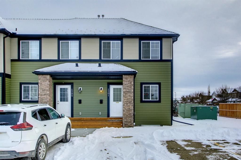 Main Photo: 1701 140 Sagewood Boulevard SW: Airdrie Row/Townhouse for sale : MLS®# A1187093
