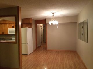 Photo 5: 7112 54 Avenue NW in Calgary: Silver Springs Semi Detached (Half Duplex) for sale : MLS®# A2019304