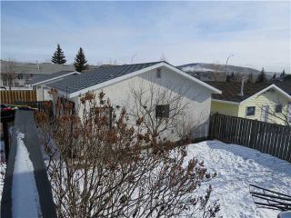 Photo 10: 6 West Copithorne Place: Cochrane Residential Detached Single Family for sale : MLS®# C3602579