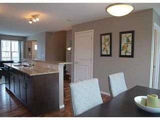 Photo 5: 418 WALDEN Drive SE in Calgary: Walden House for sale : MLS®# C3649474