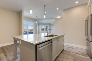 Photo 4: 410 1702 17 Avenue SW in Calgary: Scarboro Apartment for sale : MLS®# A2032534