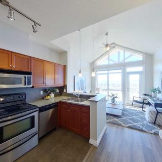 Photo 1: 13 169 Rockyledge View NW in Calgary: Rocky Ridge Row/Townhouse for sale : MLS®# A2089049