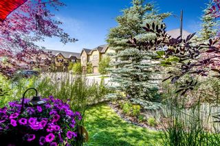 Photo 1: 309 Quarry Villas SE in Calgary: Douglasdale/Glen Row/Townhouse for sale : MLS®# A1241740