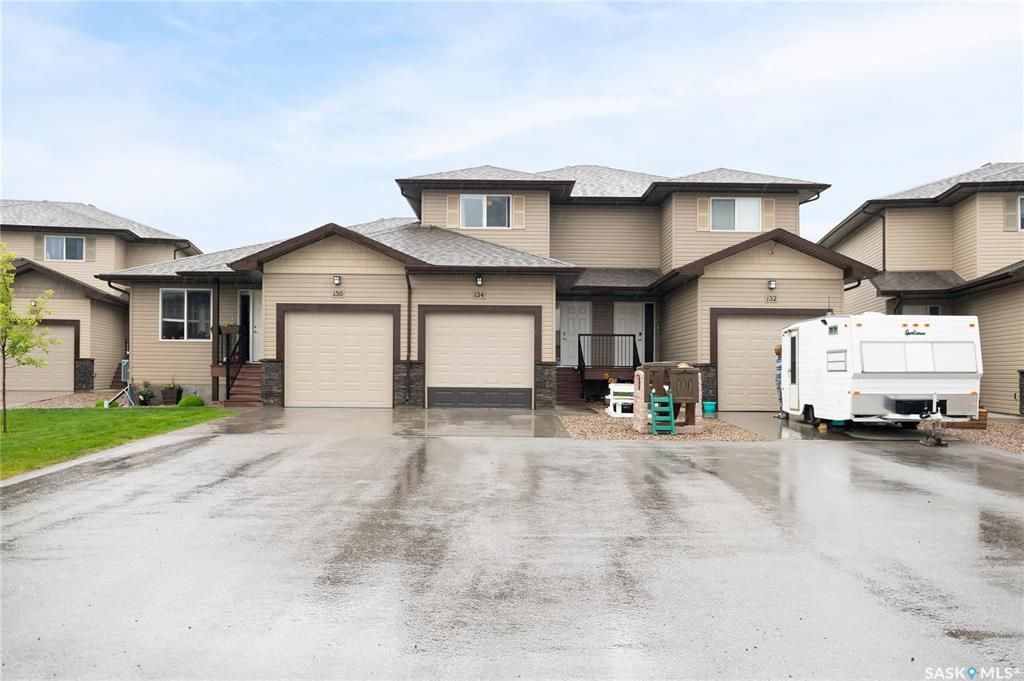 Main Photo: 134 Plains Circle in Pilot Butte: Residential for sale : MLS®# SK899500