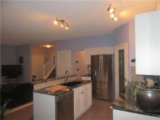 Photo 13: 106 CRYSTAL SHORES Manor: Okotoks House for sale : MLS®# C4099854