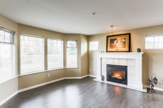 Photo 4: 106 20894 57 Avenue in Langley: Langley City Condo for sale : MLS®# R2224886