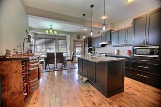 Photo 3: 101 105 STEWART CREEK RISE: Canmore Row/Townhouse for sale : MLS®# A1181136