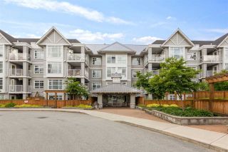 Photo 1: 107 3136 ST JOHNS Street in Port Moody: Port Moody Centre Condo for sale in "SONRISA" : MLS®# R2585034