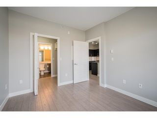 Photo 21: 407 20062 FRASER Highway in Langley: Langley City Condo for sale in "Varsity" : MLS®# R2640181