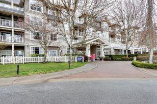 Photo 2: 109 960 LYNN VALLEY Road in North Vancouver: Lynn Valley Condo for sale in "Balmoral House" : MLS®# R2772028