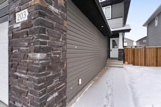 Photo 3: 203 Kolynchuk Manor in Saskatoon: Stonebridge Residential for sale : MLS®# SK914103