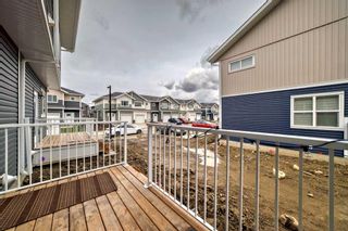Photo 38: 203 137 Red Embers Link NE in Calgary: Redstone Row/Townhouse for sale : MLS®# A2124972