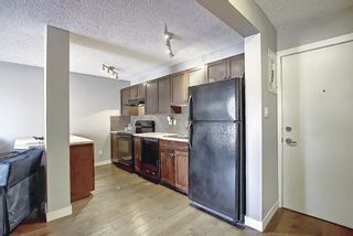 Photo 8: 105 4127 Bow Trail SW in Calgary: Rosscarrock Apartment for sale : MLS®# A1080853