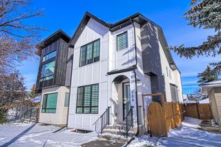 Photo 1: 704 37 Street SW in Calgary: Spruce Cliff Detached for sale : MLS®# A2036141