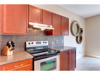Photo 12: 257 COUGARTOWN Circle SW in Calgary: Cougar Ridge House for sale : MLS®# C4025299