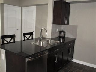Photo 5: 8407 403 Mackenzie Way SW: Airdrie Apartment for sale : MLS®# A1120611