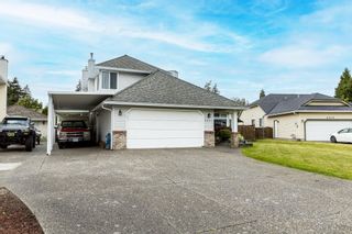 Photo 2: 5907 133A Street in Surrey: Panorama Ridge House for sale : MLS®# R2709161