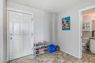 Photo 2: 9105 70 Panamount Drive NW in Calgary: Panorama Hills Apartment for sale : MLS®# A2070467