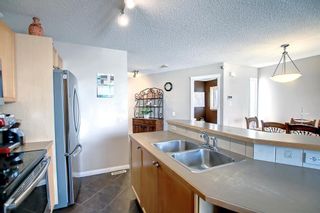 Photo 6: 385 Tuscany Valley View NW in Calgary: Tuscany Detached for sale : MLS®# A1228389