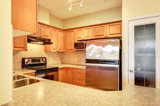 Photo 11: . 1402 Lake Fraser Green SE in Calgary: Lake Bonavista Apartment for sale : MLS®# A1157071