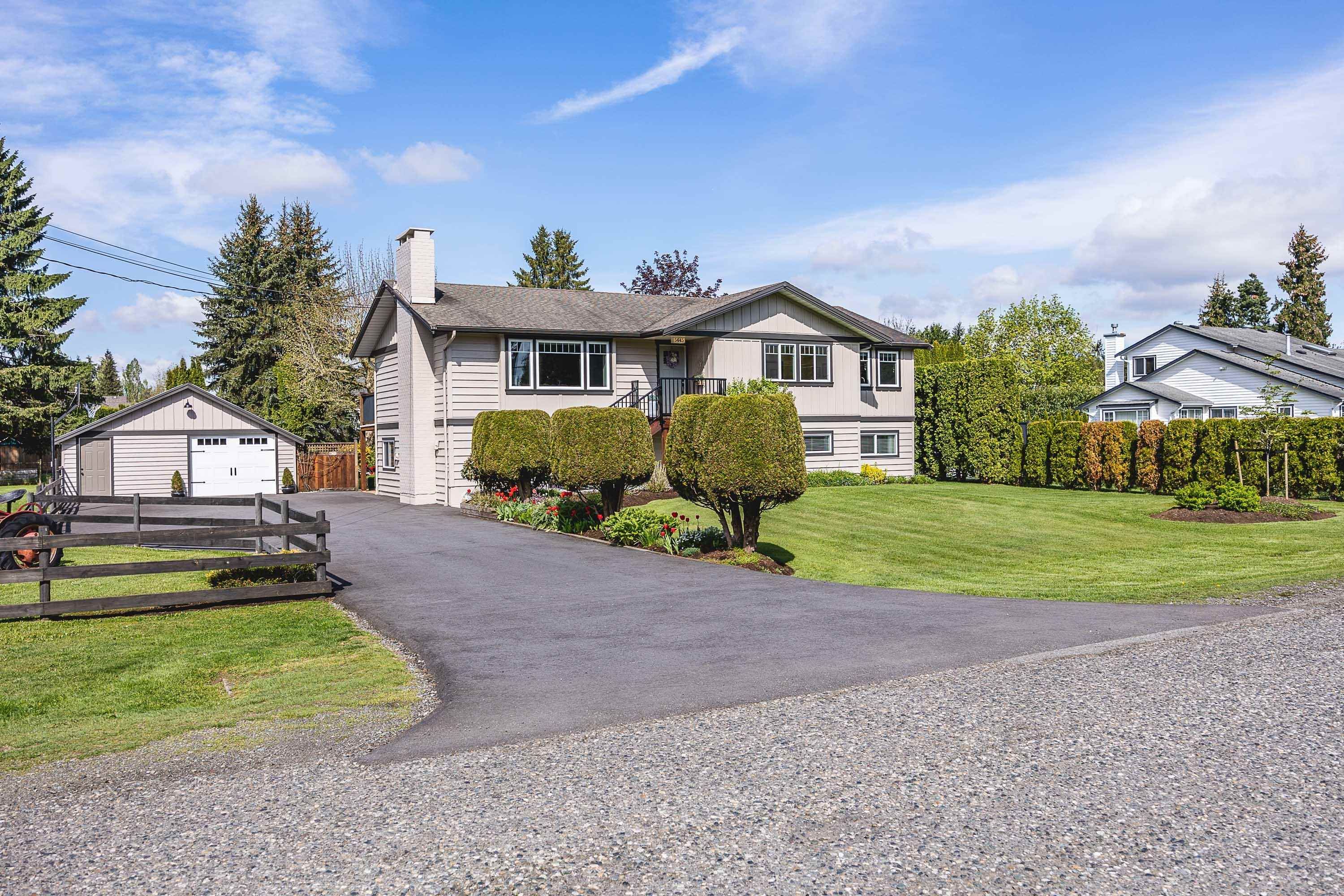 Main Photo: 5645 246 Street in Langley: Salmon River House for sale in "Strawberry Hills" : MLS®# R2775977