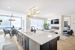 Photo 2: 216 15 Cougar Ridge Landing SW in Calgary: Patterson Apartment for sale : MLS®# A1210927