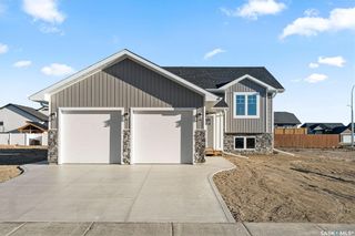 Photo 1: 604 Ballesteros Crescent in Warman: Residential for sale : MLS®# SK952551