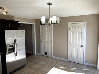 Photo 4: 11 900 Allen Street SE: Airdrie Row/Townhouse for sale : MLS®# A2012791