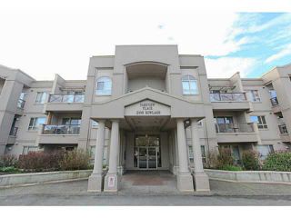Photo 1: 227 2109 ROWLAND Street in Port Coquitlam: Central Pt Coquitlam Condo for sale in "PARKVIEW PLACE" : MLS®# V1108179