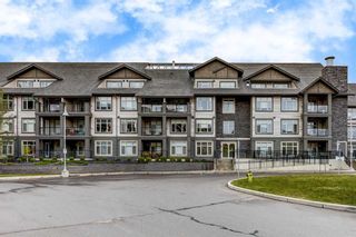 Main Photo: 111 25 Aspenmont Heights SW in Calgary: Aspen Woods Apartment for sale : MLS®# A2082851