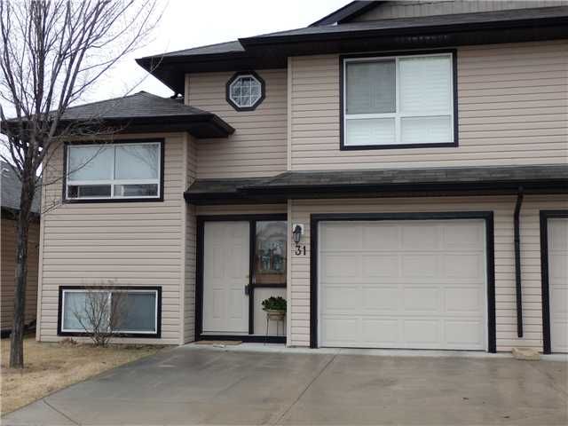 Main Photo: 31 103 FAIRWAYS Drive NW: Airdrie Townhouse for sale : MLS®# C3611153