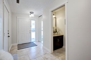 Photo 12: 212 Coachway Lane SW in Calgary: Coach Hill Row/Townhouse for sale : MLS®# A1153091