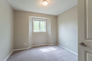 Photo 13: 98 Mt Aberdeen Manor SE in Calgary: McKenzie Lake Row/Townhouse for sale : MLS®# A1220414