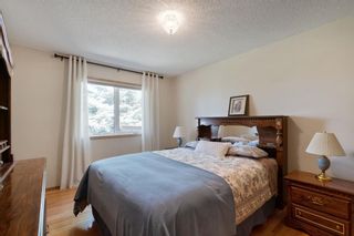 Photo 21: 21 Sandarac Circle NW in Calgary: Sandstone Valley Row/Townhouse for sale : MLS®# A2048786