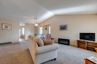 Photo 2: 104 Arbour Cliff Close NW in Calgary: Arbour Lake Semi Detached (Half Duplex) for sale : MLS®# A2069139