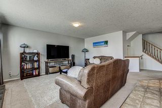 Photo 6: 28 Cougarstone Square SW in Calgary: Cougar Ridge Detached for sale : MLS®# A1099416