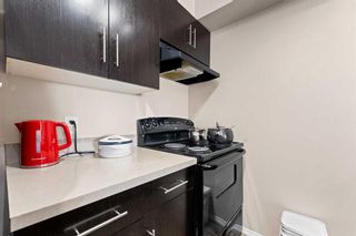Photo 8: 404 7130 80 Avenue NE in Calgary: Saddle Ridge Apartment for sale : MLS®# A2111706