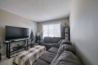 Photo 8: 555 Panatella Boulevard NW in Calgary: Panorama Hills Row/Townhouse for sale : MLS®# A2034434
