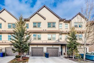 Photo 1: 102 28 Heritage Drive: Cochrane Row/Townhouse for sale : MLS®# A1179649