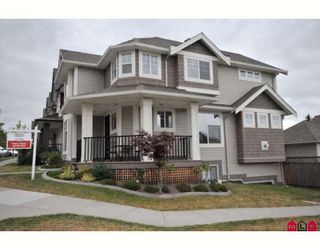 Photo 1: 16408 60TH Avenue in Surrey: Cloverdale BC House for sale in "BIRDSONGS" (Cloverdale)  : MLS®# F2915229
