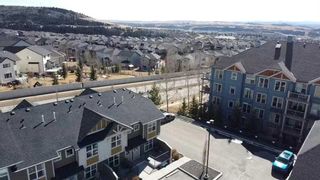 Photo 2: 705 101 Sunset Drive: Cochrane Row/Townhouse for sale : MLS®# A2106577