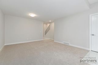 Photo 11: 948 Crestridge Common SW in Calgary: Crestmont Row/Townhouse for sale : MLS®# A2012906