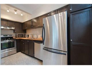 Photo 8: 11 877 W 7TH Avenue in Vancouver: Fairview VW Townhouse for sale in "EMERALD COURT" (Vancouver West)  : MLS®# V1061209